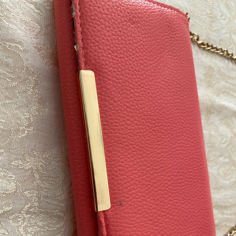 salmon colored small purse